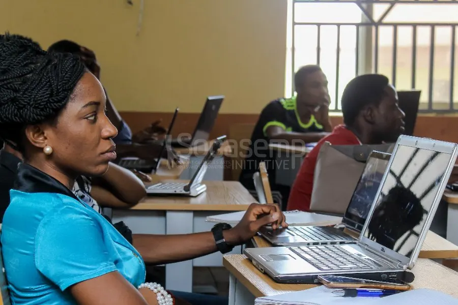 SAYLET participants learning on laptops