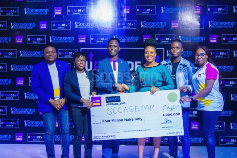 Partners presenting the FCMB grant at UPGRADE 2019