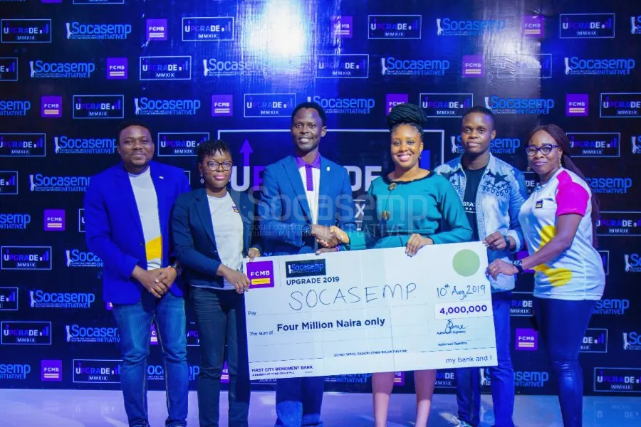 Partners presenting the FCMB grant at UPGRADE 2019